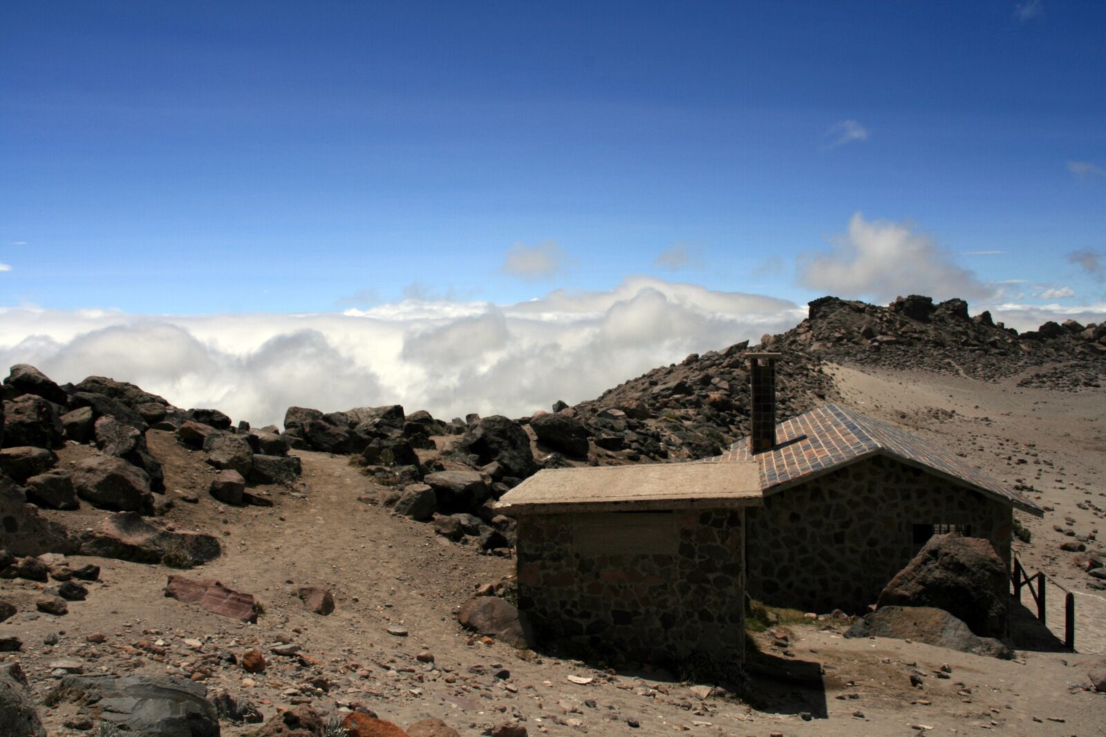 #LifeAtExpediaGroup High above the clouds on Cayambe volcano (5,790 m) Several interesting facts about this Volcano. At 4,690 metres on its south slope is the highest point in the world crossed by the Equator, and the only point on the Equator with snow cover. Cayambe's peak is the point of Earth's surface farthest from its axis; thus it rotates the fastest as Earth spins.