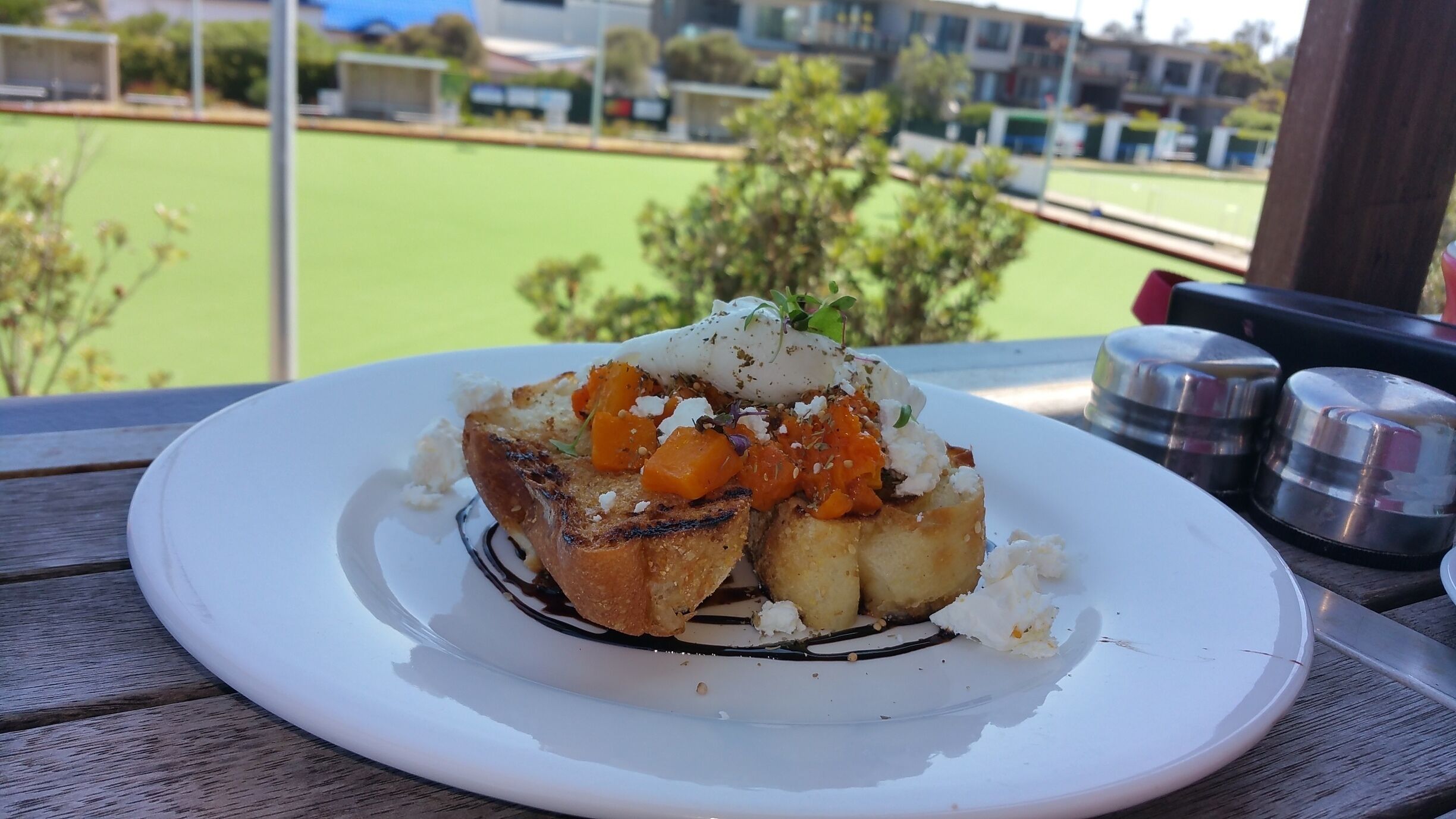 Brilliant venue with beautiful beach view along with the bowling greens.   All day breakfast followed by a walk along the beach.   This dish is roasted pumpkin, zataar, feta and poached egg on turkish toast   - delish
Cakes and coffee are also great.   Take some change for parking if you aren't a local with a foreshore parking permit.  Disabled access.