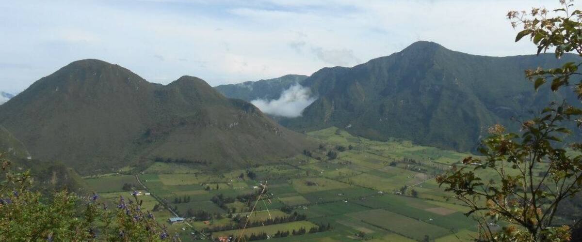 The village in the valley. This tiny area is occupied only by homesteading farmers whose families have lived there for generations. The area is a geobiological reserve and is protected from new development. Dormant volcanoes frame it on all sides and once created the area long ago when they were active.