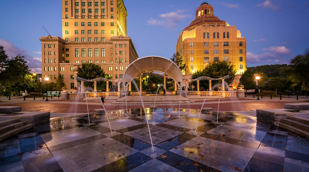Fountains and buildings at night, at Pack Square Park, in downto