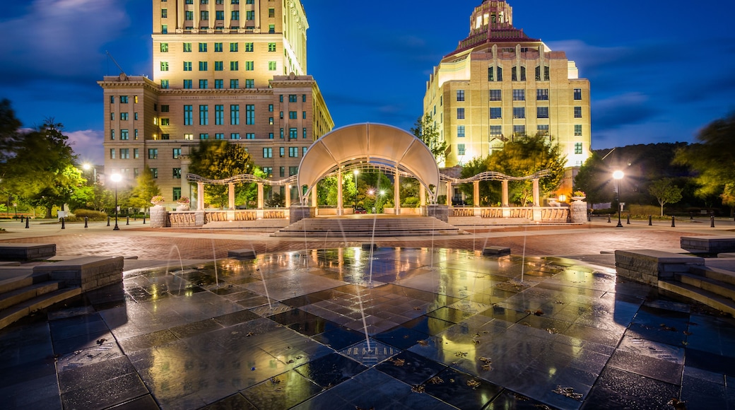 Fountains and buildings at night, at Pack Square Park, in downto