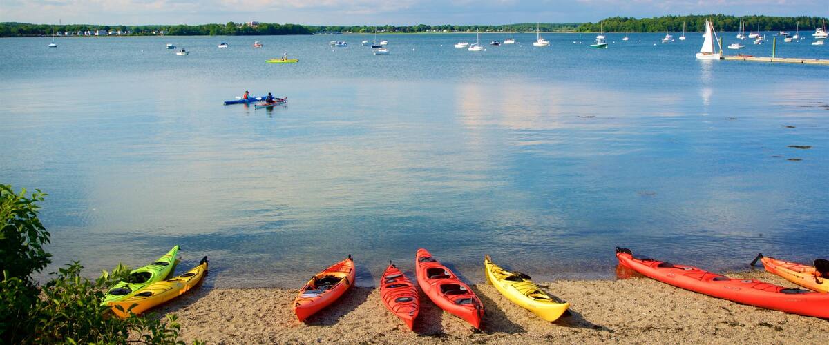 Eastern Promenade which includes general coastal views and a sandy beach
