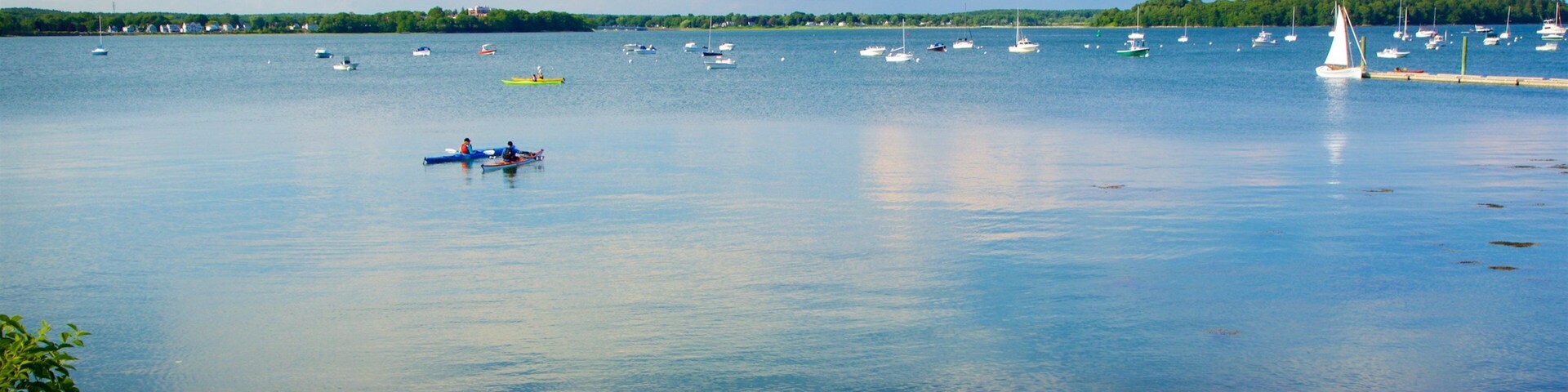 Eastern Promenade which includes general coastal views and a sandy beach
