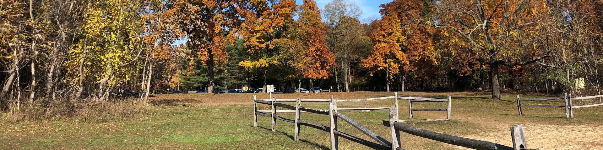 Autumn leaves and an old fence at Blydenburgh County Park in Smithtown, Long Island, New York.