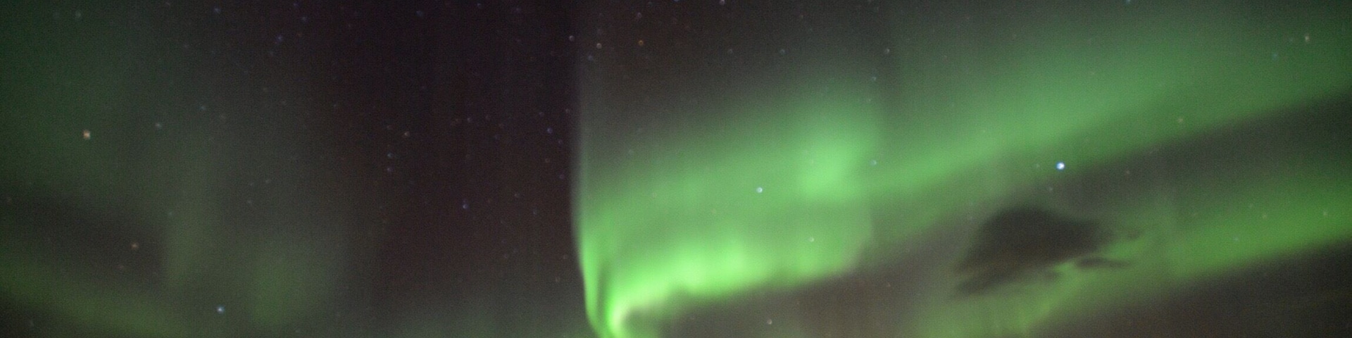 Took this pic of the aurora borealis with Laila at the Malangen Resort near Tromso, Norway. Was a great night and the fulfillment of a childhood dream.