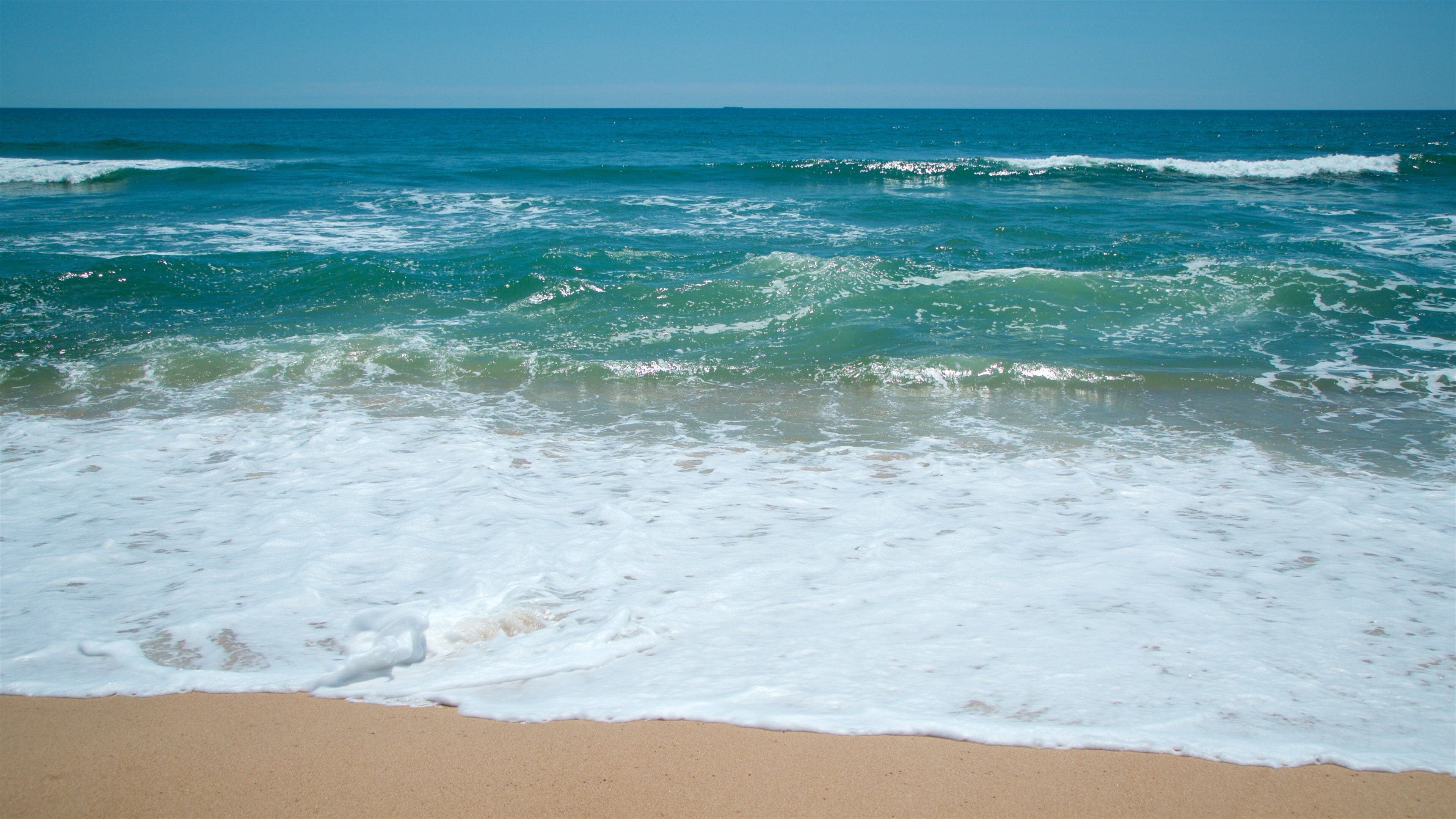 East Hampton Main Beach which includes a sandy beach and general coastal views
