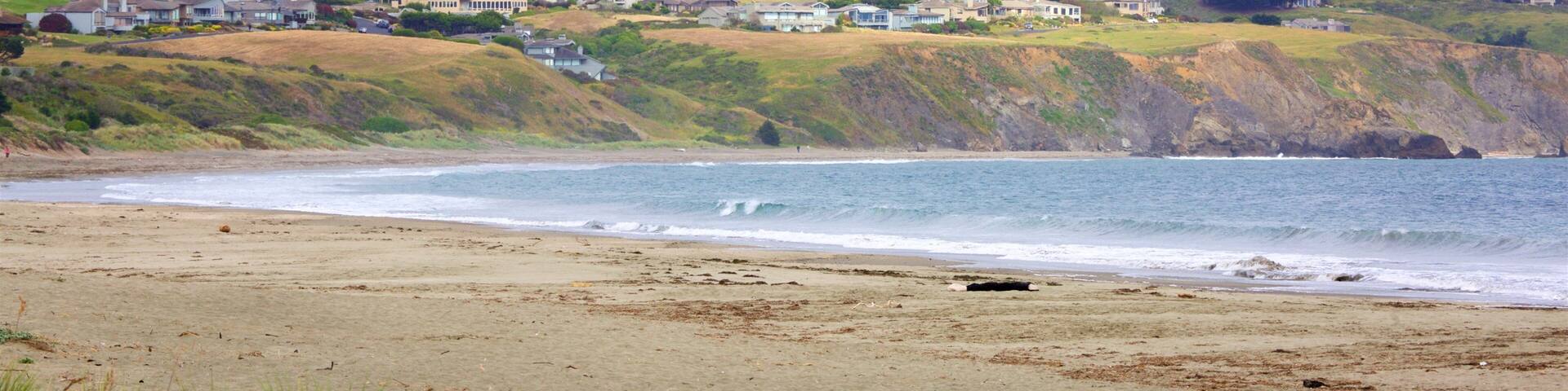 Doran Beach showing a sandy beach, general coastal views and tranquil scenes