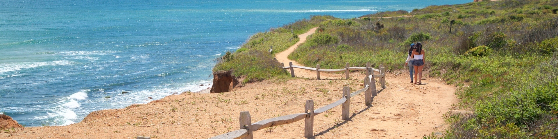 Shadmoor State Park showing general coastal views and a beach as well as a couple