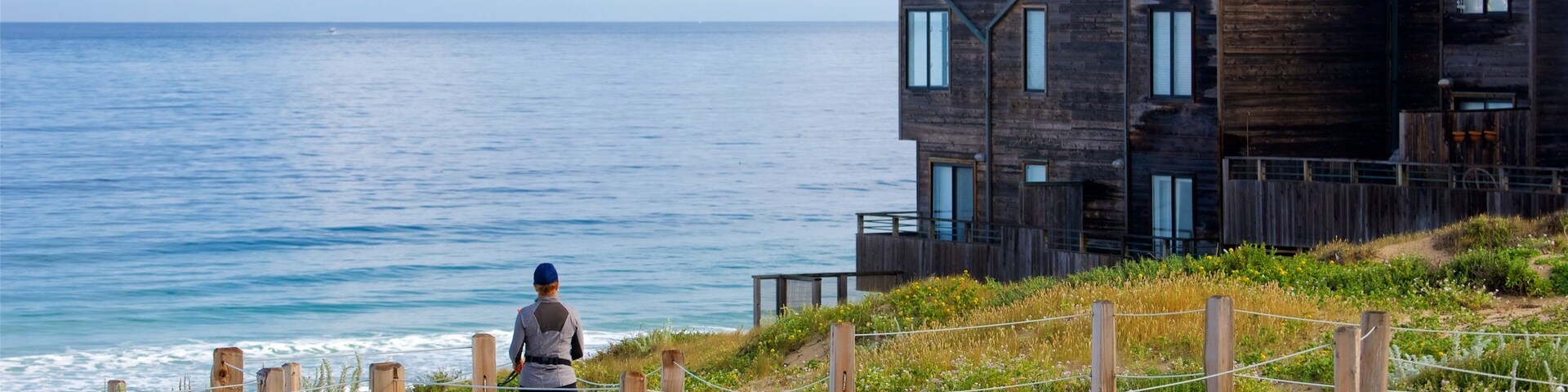 Del Monte Beach showing a beach, general coastal views and a house