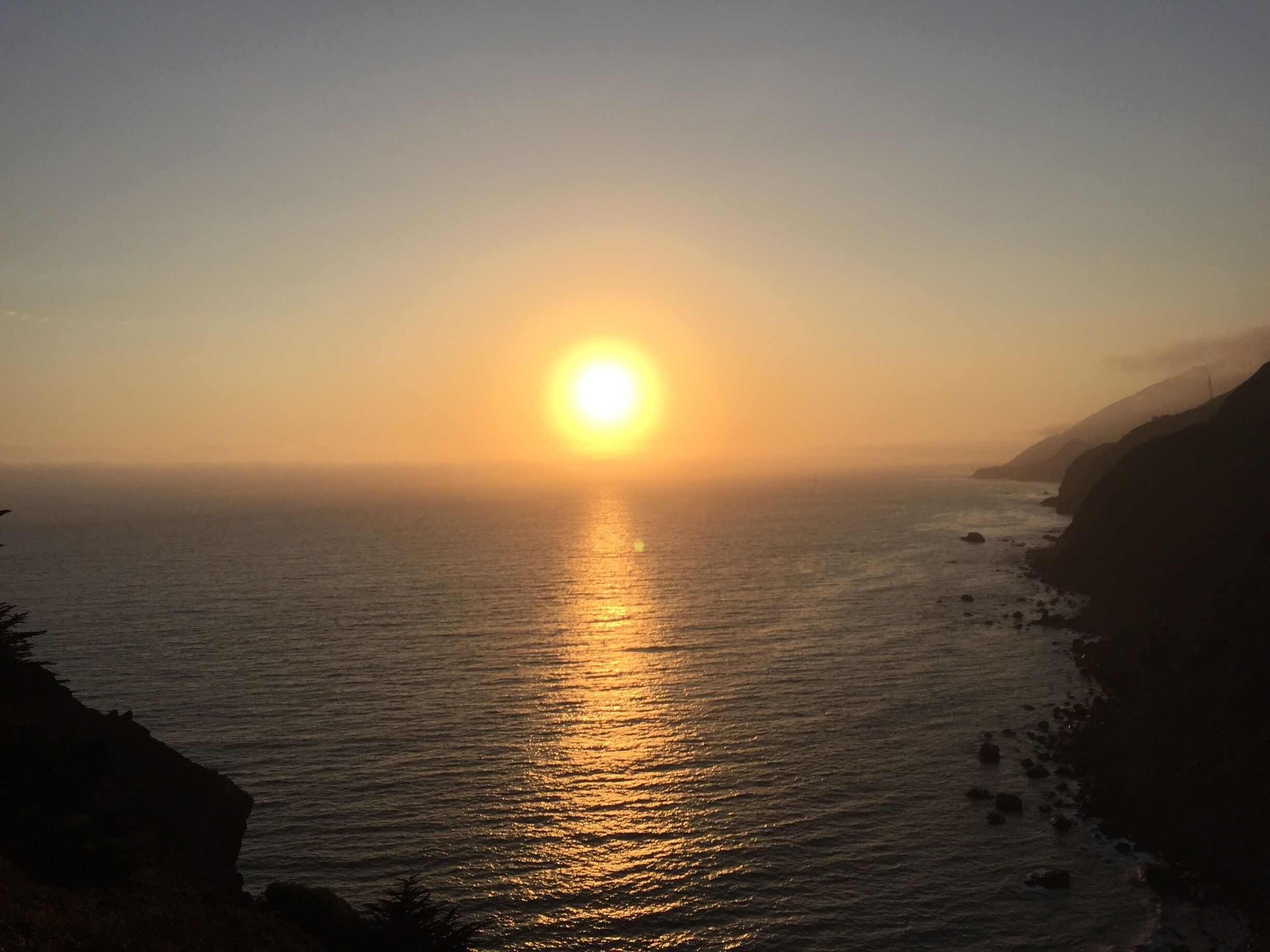 Big Sur is a must when in California. And you absolutely have to catch the sunset there, it's a surreal experience. If you're adventurous, the ultimate coastal drive is southward -- from SF to LA. That way, you'd be driving on the edge. 