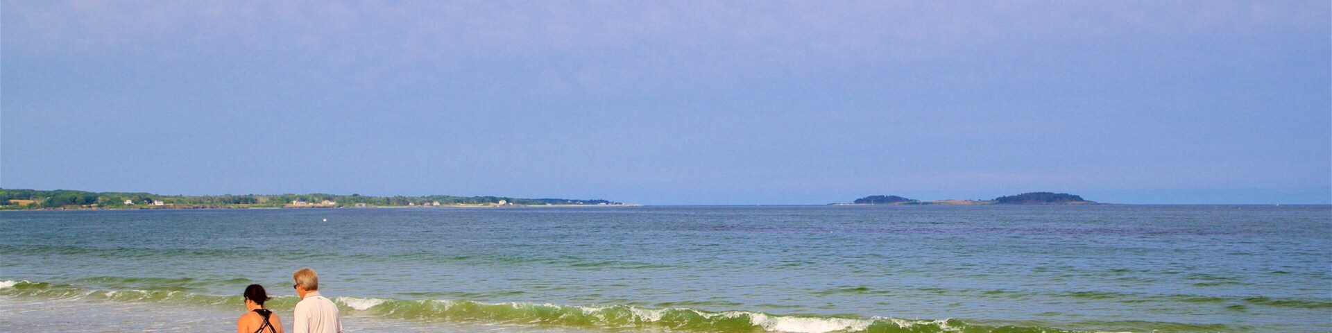 Parque Estadual de Scarborough Beach que inclui uma praia de areia e paisagens litorâneas assim como um casal
