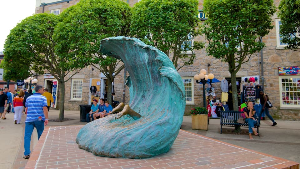 Thames Street which includes outdoor art as well as a small group of people