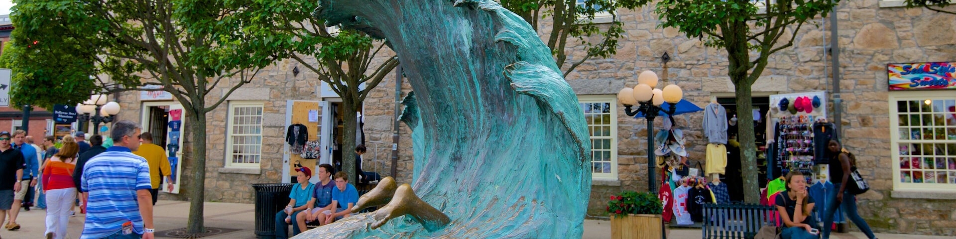 Thames Street which includes outdoor art as well as a small group of people