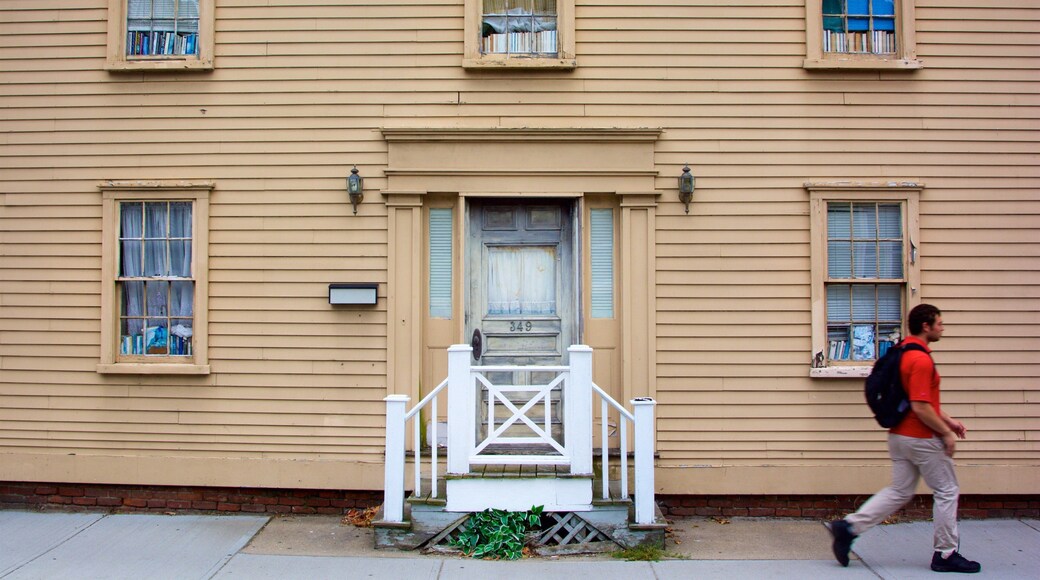 Thames Street showing a house as well as an individual male