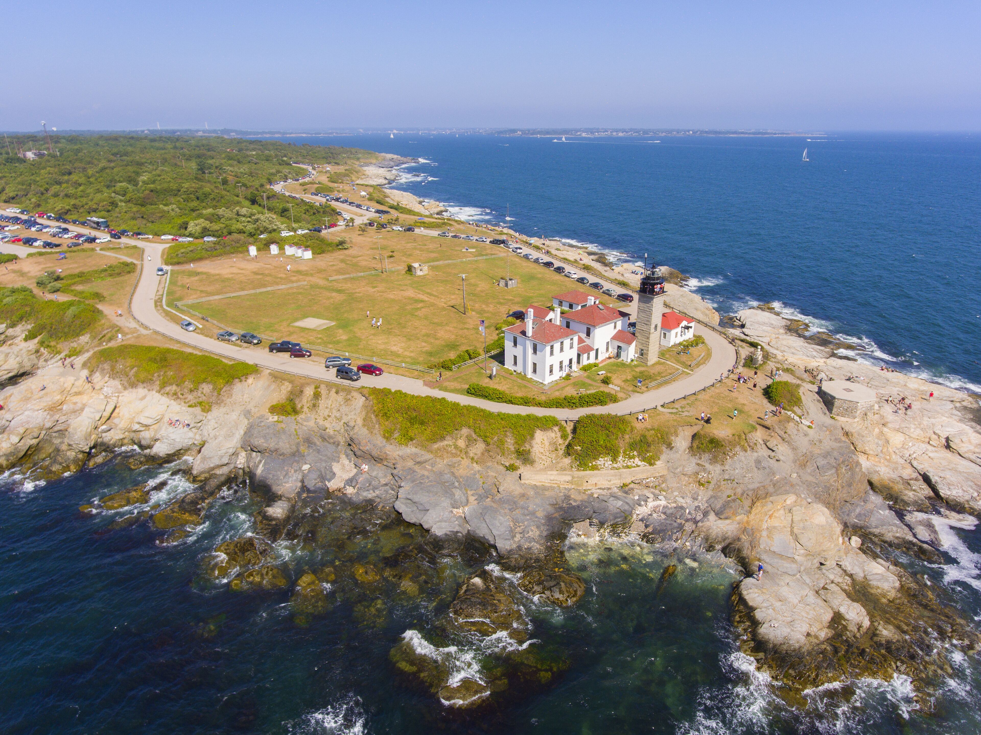Beavertail Lighthouse in Beavertail State Park aerial view in summer, Jamestown, Rhode Island RI, USA. This lighthouse, built in 1856, at the entrance to Narragansett Bay on Conanicut Island.