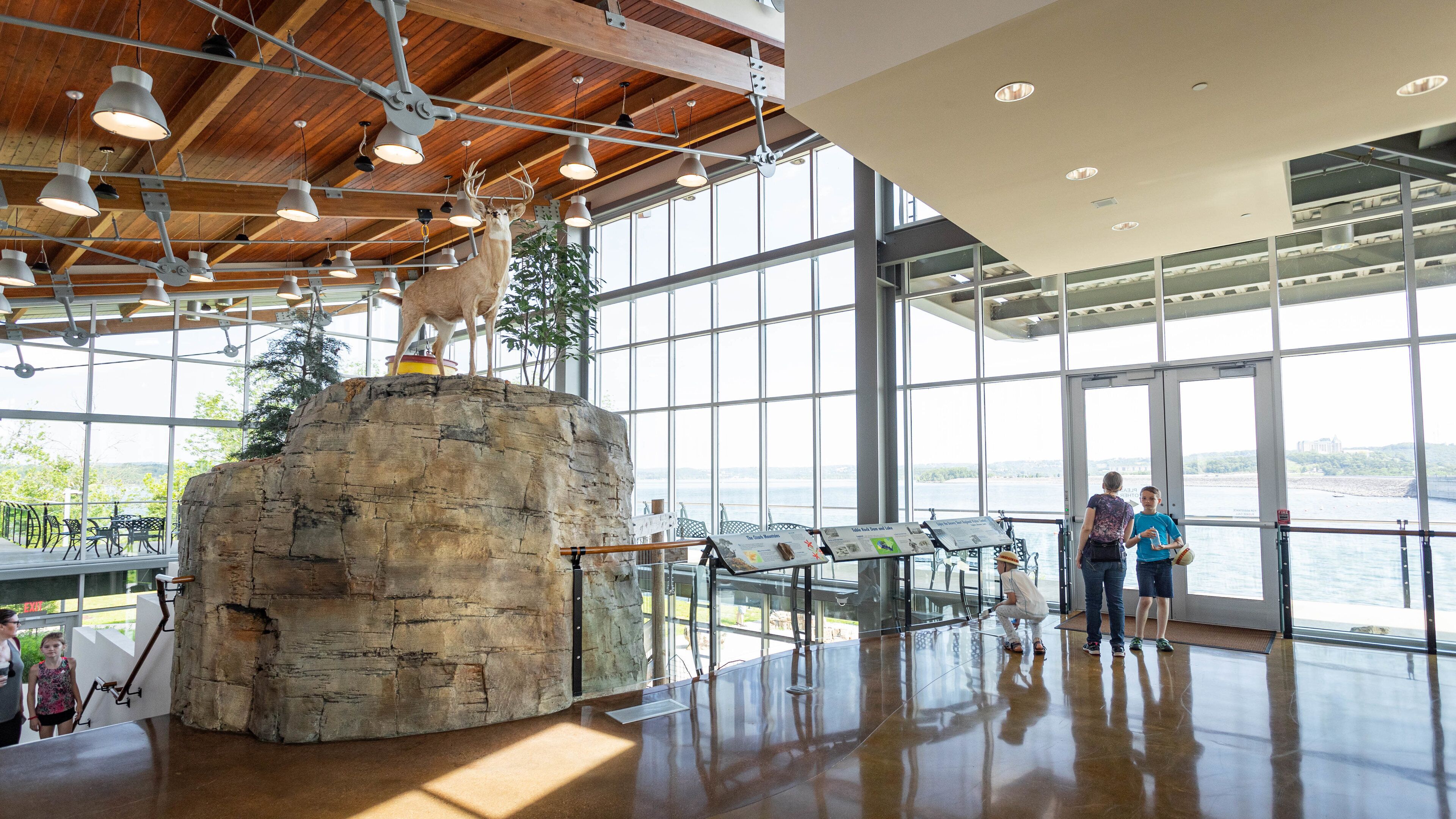 Dewey Short Visitor Center showing interior views as well as a family