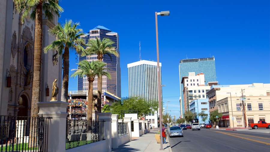 Catedral de San Agustín que incluye un rascacielos y escenas urbanas