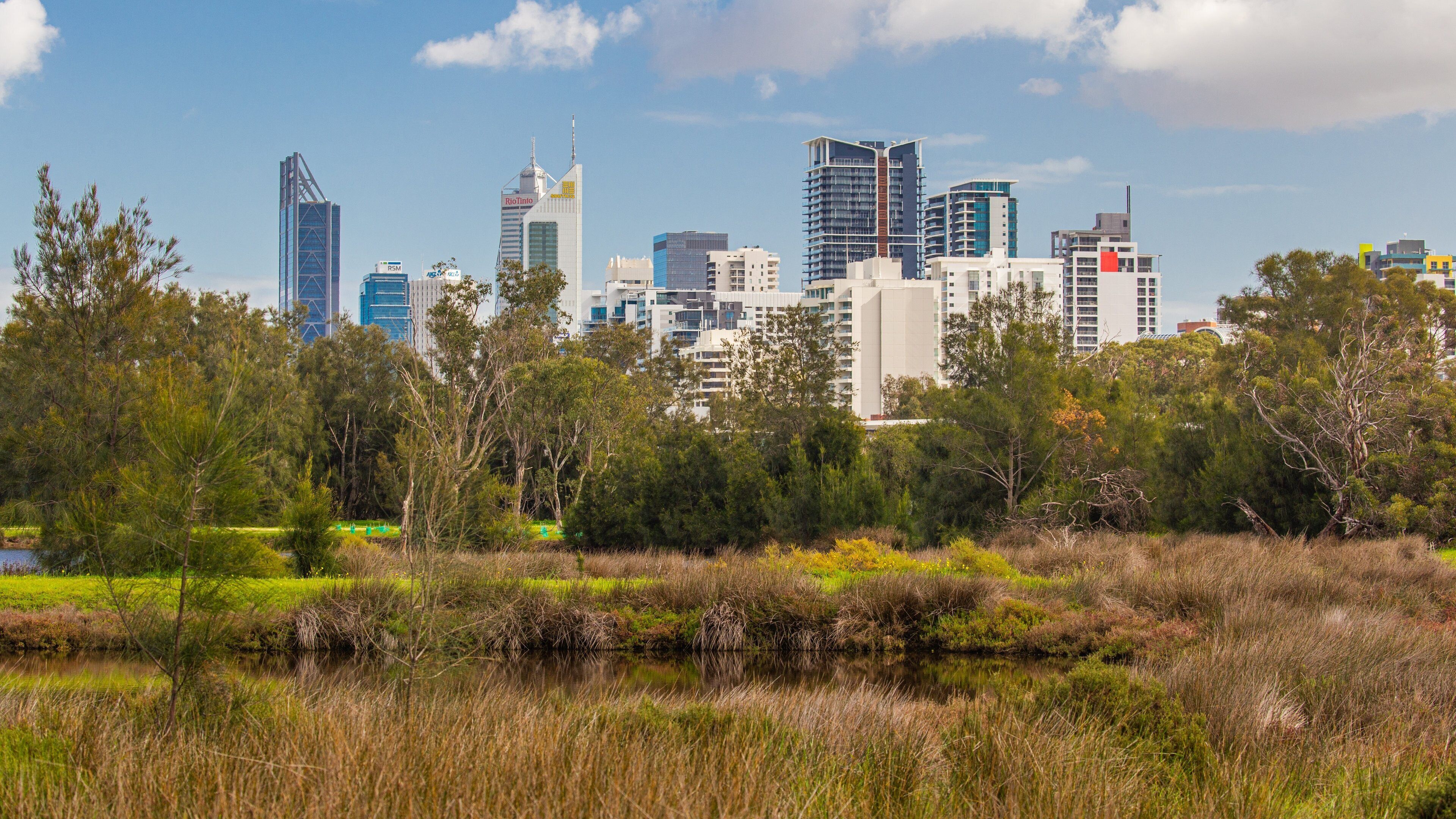 Heirisson Island featuring a city and a river or creek