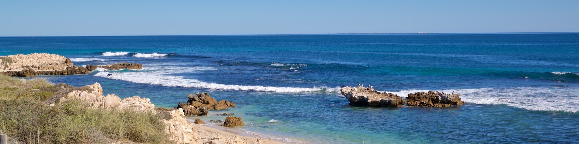 Trigg Beach which includes rugged coastline, landscape views and general coastal views