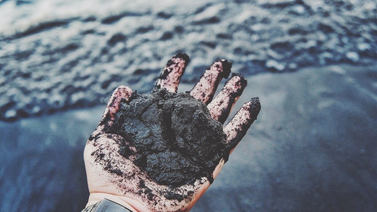 • A Handful of Lava •

Black sand it is! :P
Basically, black sand beaches is formed due to the nearby volcanic activities.

North Sulawesi has several active and passive volcanos such as Lokon, Klabat, Mahawu, Soputan and other mountains. The latest volcanic eruption happened last year.

What is unique about Lembeh strait is that it has both white sand and black sand beaches. Moreover, it has beautiful sceneries and you could enjoy sunrise from here.

What is more even unique is found below the surface. The marine life is very different, you could find the tiniest horse sea, frogfish and other beautifully ugly animals. Unfortunately, i haven't obtained a diving license yet therefore i could not provide you with some underwater pictures.

Black Sand Dive Retreat is the perfect place to live when you visit Lembeh Strait for its magnificent marine life. It has nice and private bungalows, friendly and knowledgable staff, great meals and situated not far from Bitung city.

What to do:
- Diving
- Boat ride
- Banana Boat
- Exploring the surrounded areas
- Having a handful of lava on your palm!