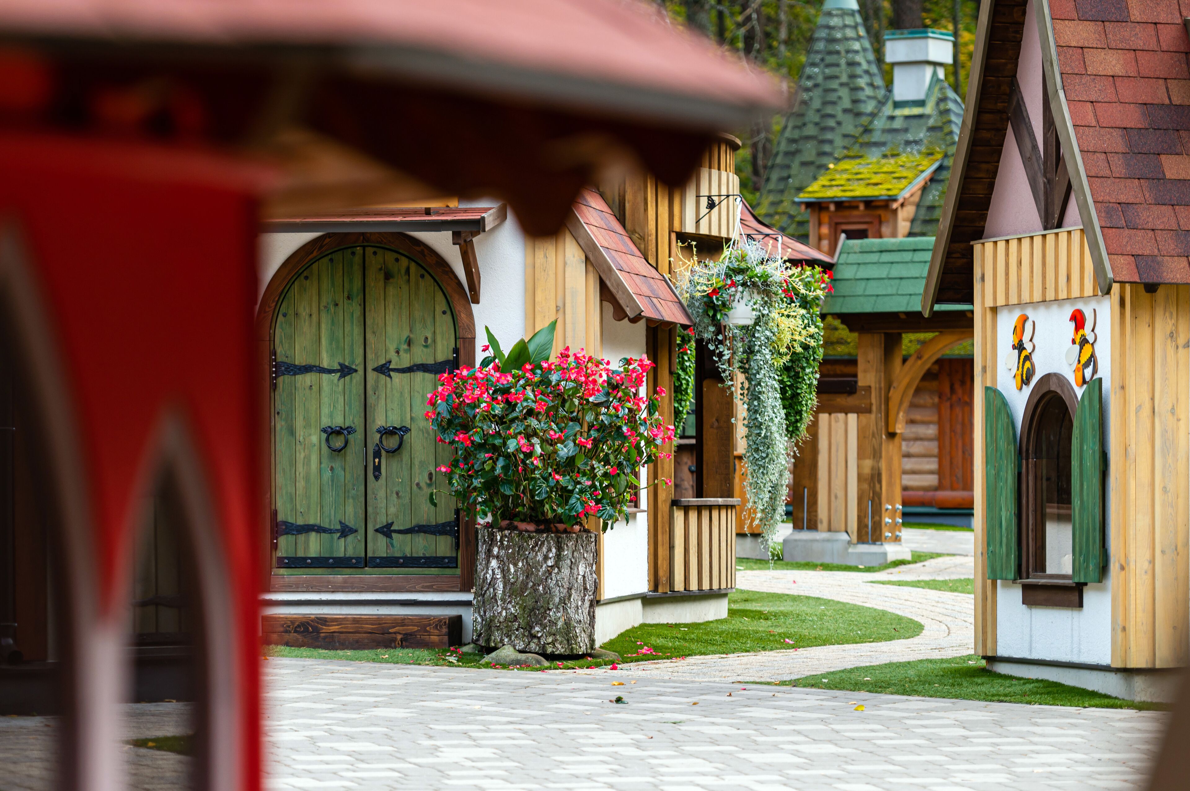 gnome village in attraction park, tiny dwarf houses with colorful facades, fairy tale village
