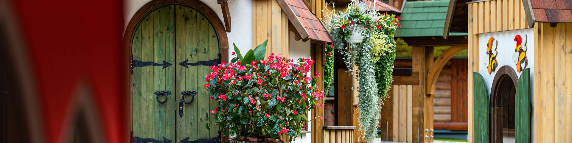 gnome village in attraction park, tiny dwarf houses with colorful facades, fairy tale village