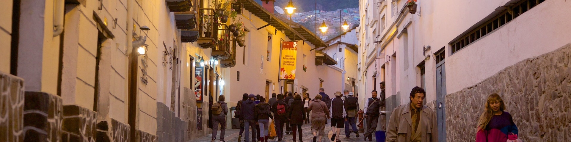 Calle La Ronda showing street scenes and night scenes as well as a large group of people