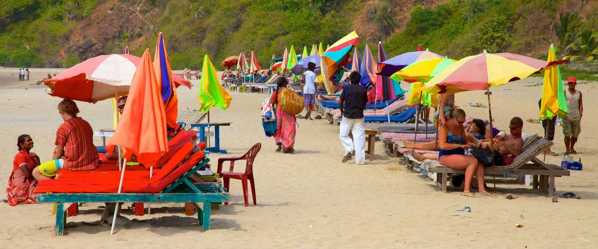 Kalacha Beach featuring a sandy beach as well as a large group of people