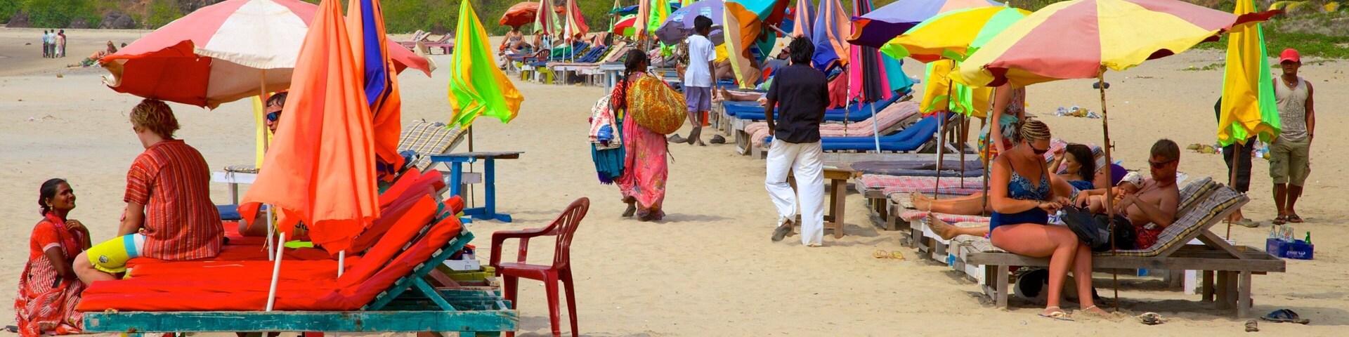 Kalacha Beach which includes a sandy beach as well as a large group of people