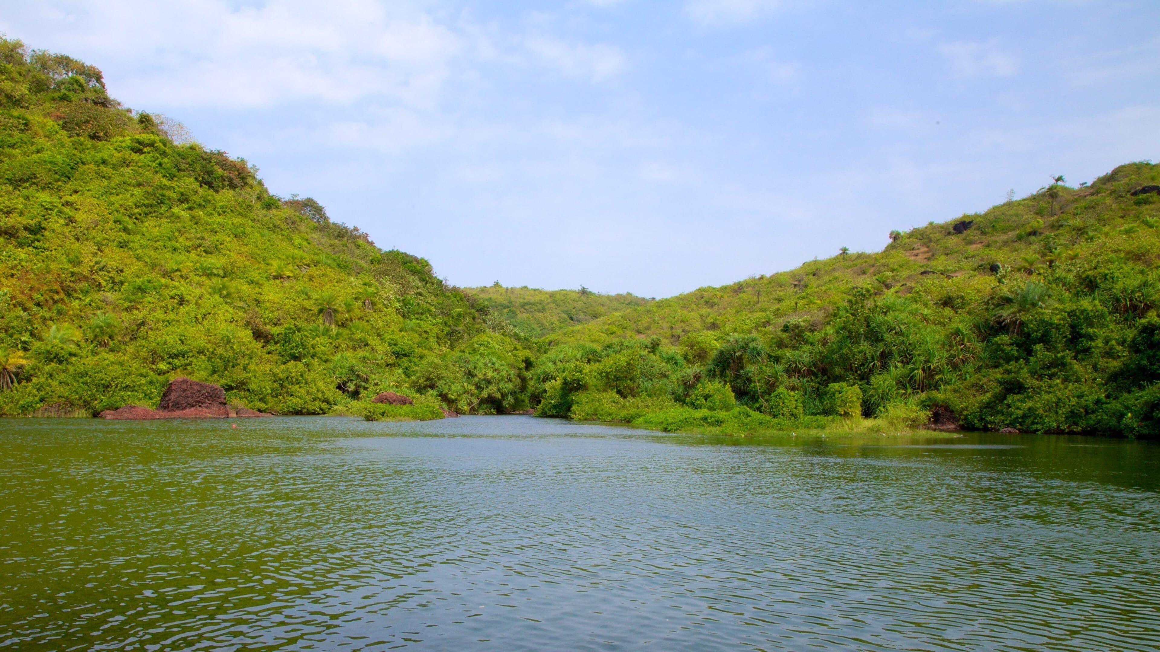 Arambol Sweet Water Lake which includes landscape views and a lake or waterhole