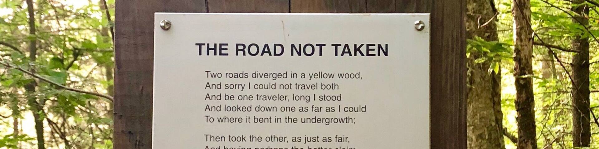 The Robert Frost Interpretive Trail is about 1.2 miles long-.3 miles are on a boardwalk, the rest trail. As you weave through swamp, trees, over a stream, through a field, his poems are posted along the way. Benches are located throughout. I went just after sunrise and the field was full of birds.