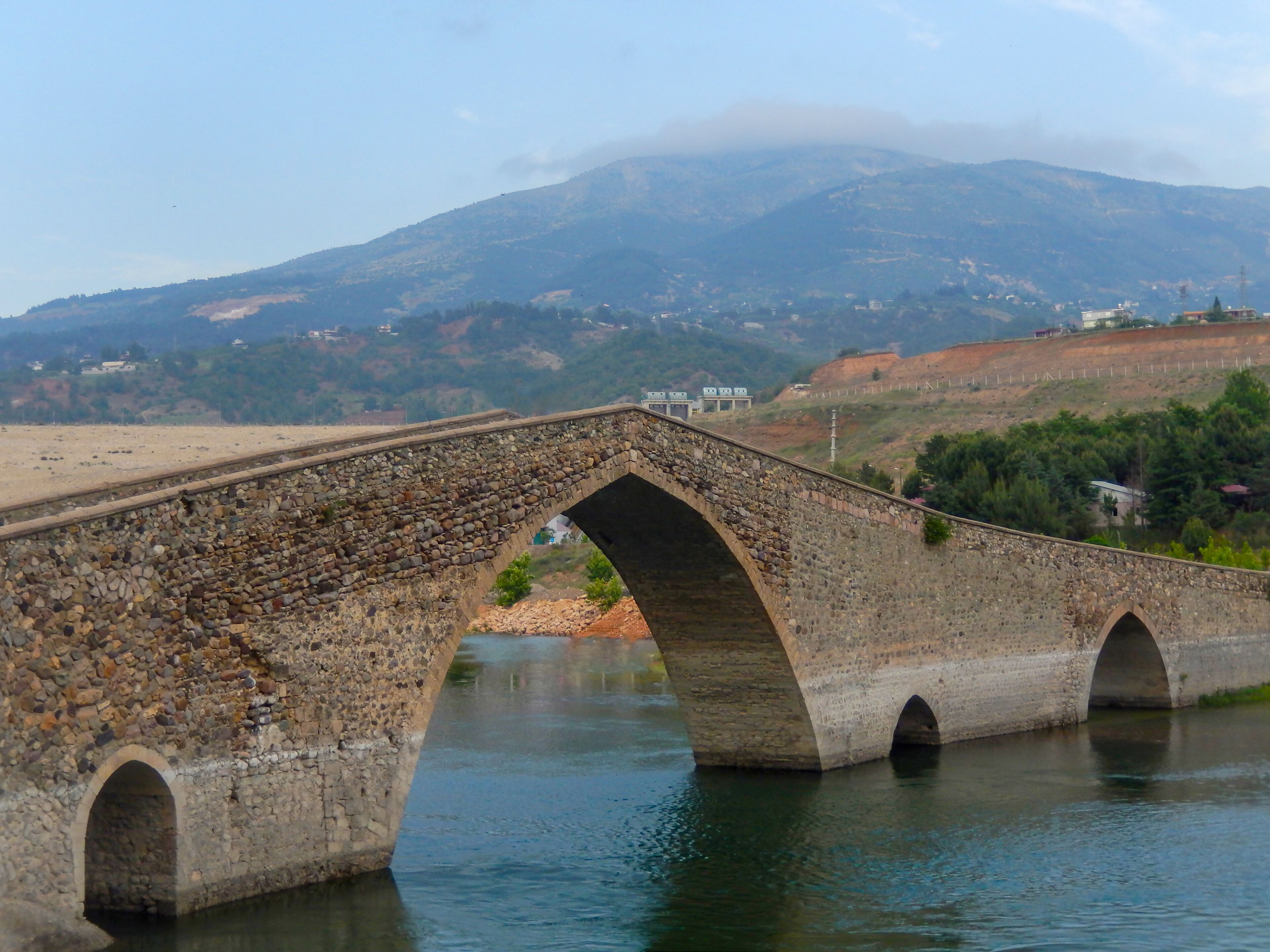 Old multi arched stone bridge on Ceyhan River, Kahramanmaras, Turkey