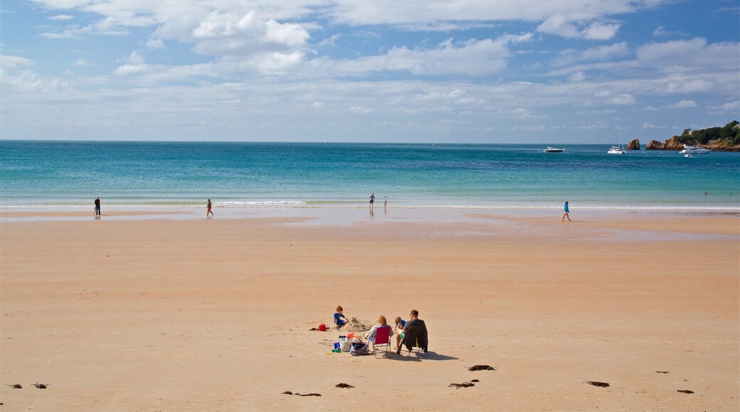 St Brelade\'s Bay Beach which includes general coastal views and a beach as well as a family