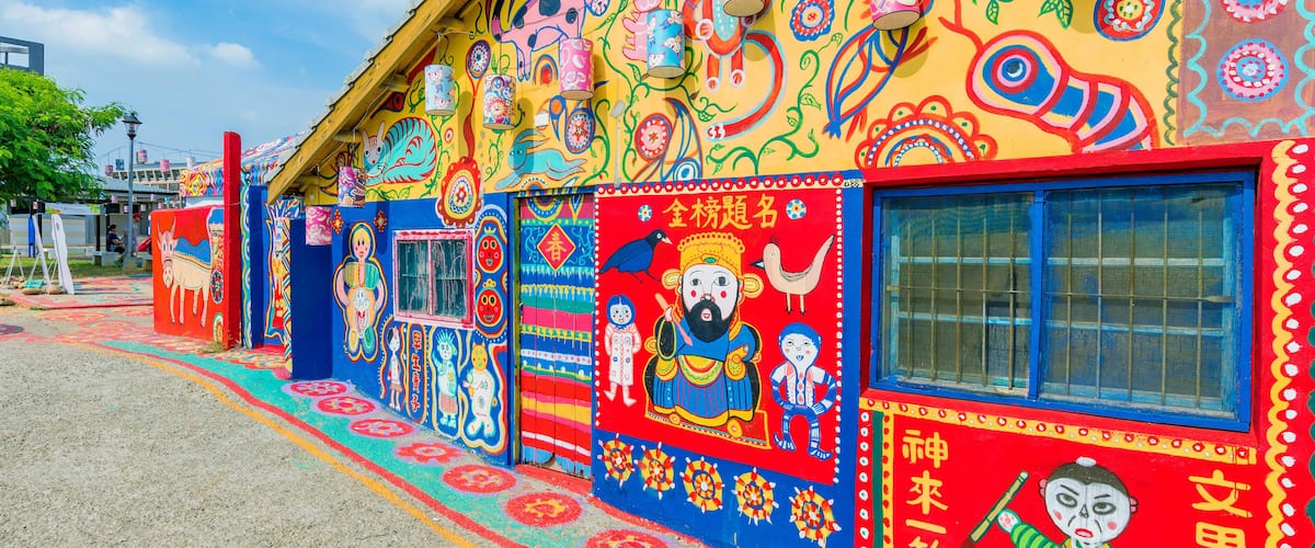 KANJ4D TAICHUNG, TAIWAN - JULY 19: Rainbow village is a popular travel destination where people can view colorful paintings and illustrations on the walls of