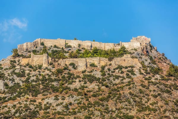 Impressive fortress ruins on a mountain top against a clear blue sky. Castle Softa in Turkey, the Mersin Province