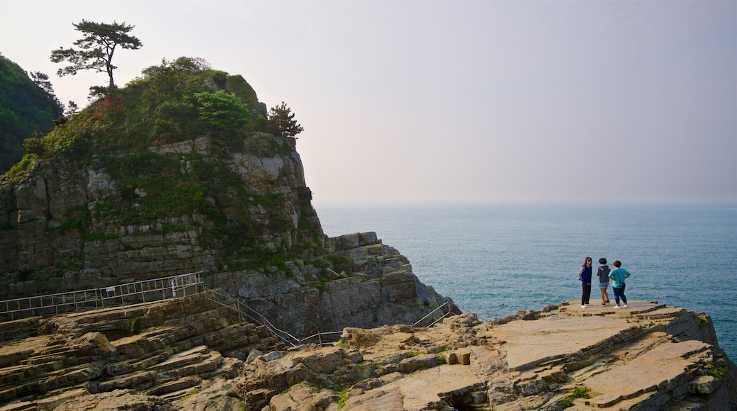 Sinseondae Observatory which includes general coastal views and rugged coastline as well as a small group of people