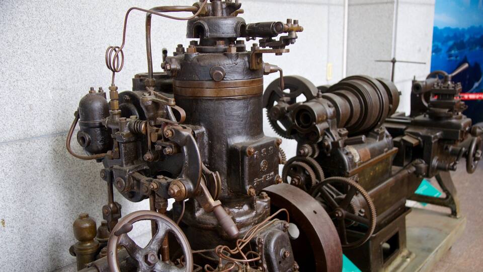 An old, rusted mechanical device with gears and pipes.