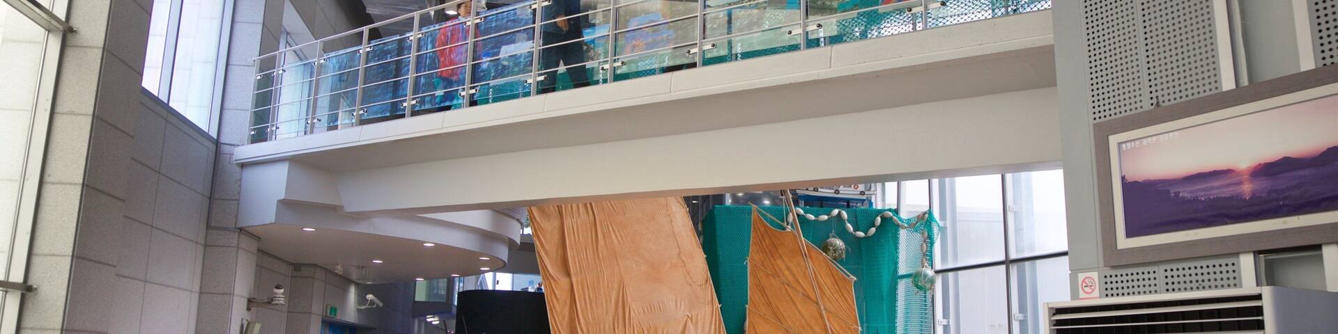 Tongyeong Fisheries Science Museum which includes general coastal views and interior views