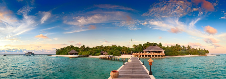 Beautiful sunset over ocean island maldives long panorama