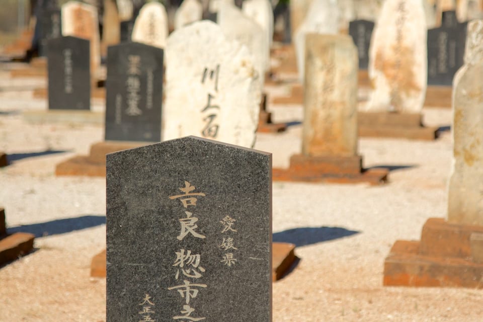 A cemetery with gravestones.