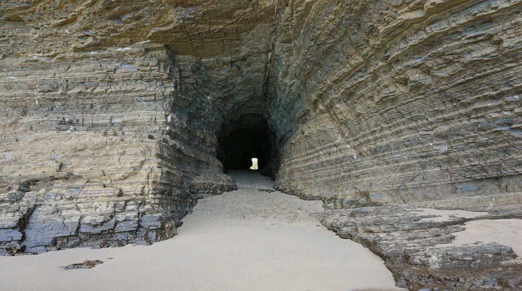 Tunnel in the rock on the coast, connecting beaches of La Roche Percee to Turtle Bay, Bourail, Grande Terre, New Caledonia, south Pacific