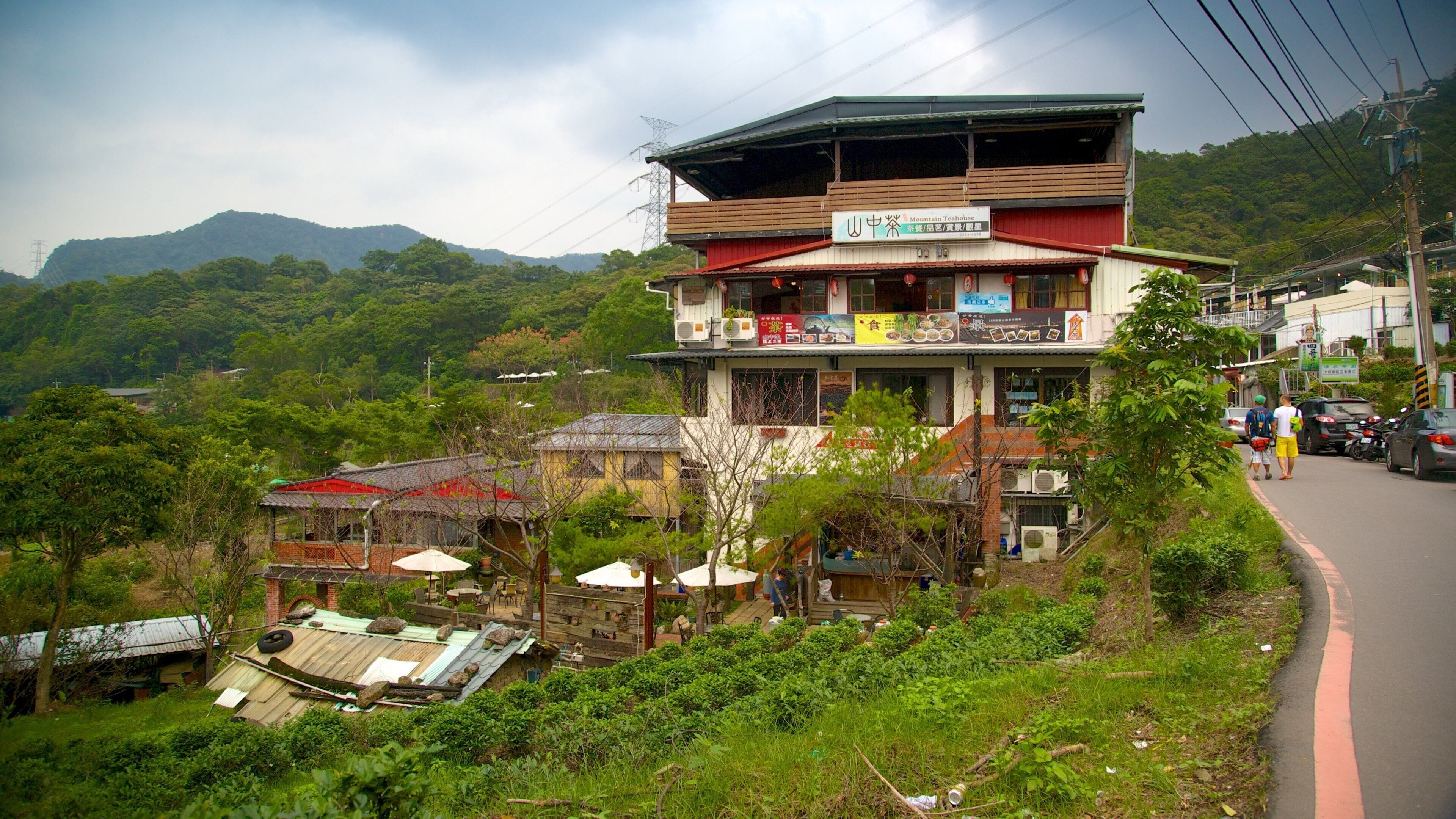 Taipei which includes mountains and a small town or village