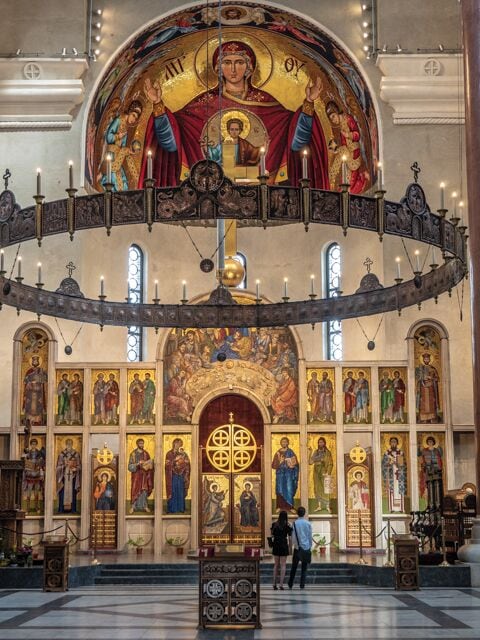 Alter and iconostasis of St Mark’s Church in Belgrade. Floor and  iconostatis frame are made from marble. The icons are mosaic.  The apolielei, ring holding candles, is made from copper. 

Though the church was built between 1931 and 1940 the interior is still not fully completed.
