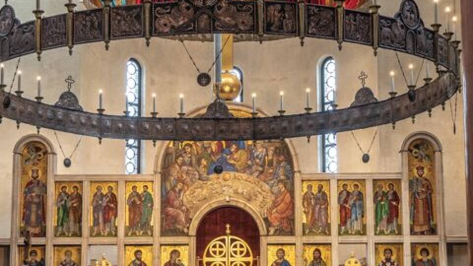 Alter and iconostasis of St Mark’s Church in Belgrade. Floor and iconostatis frame are made from marble. The icons are mosaic. The apolielei, ring holding candles, is made from copper.
Though the church was built between 1931 and 1940 the interior is still not fully completed.