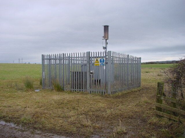 Gas Burner. This device detects and burns off methane produced by the landfill site buried below this field.