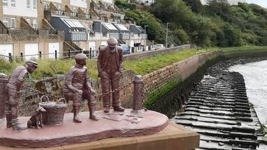 Sculptures commemorating the local fishing industry in Maryport.
