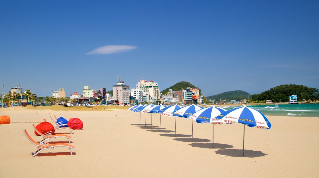 Songjeong Beach featuring general coastal views, a beach and a coastal town