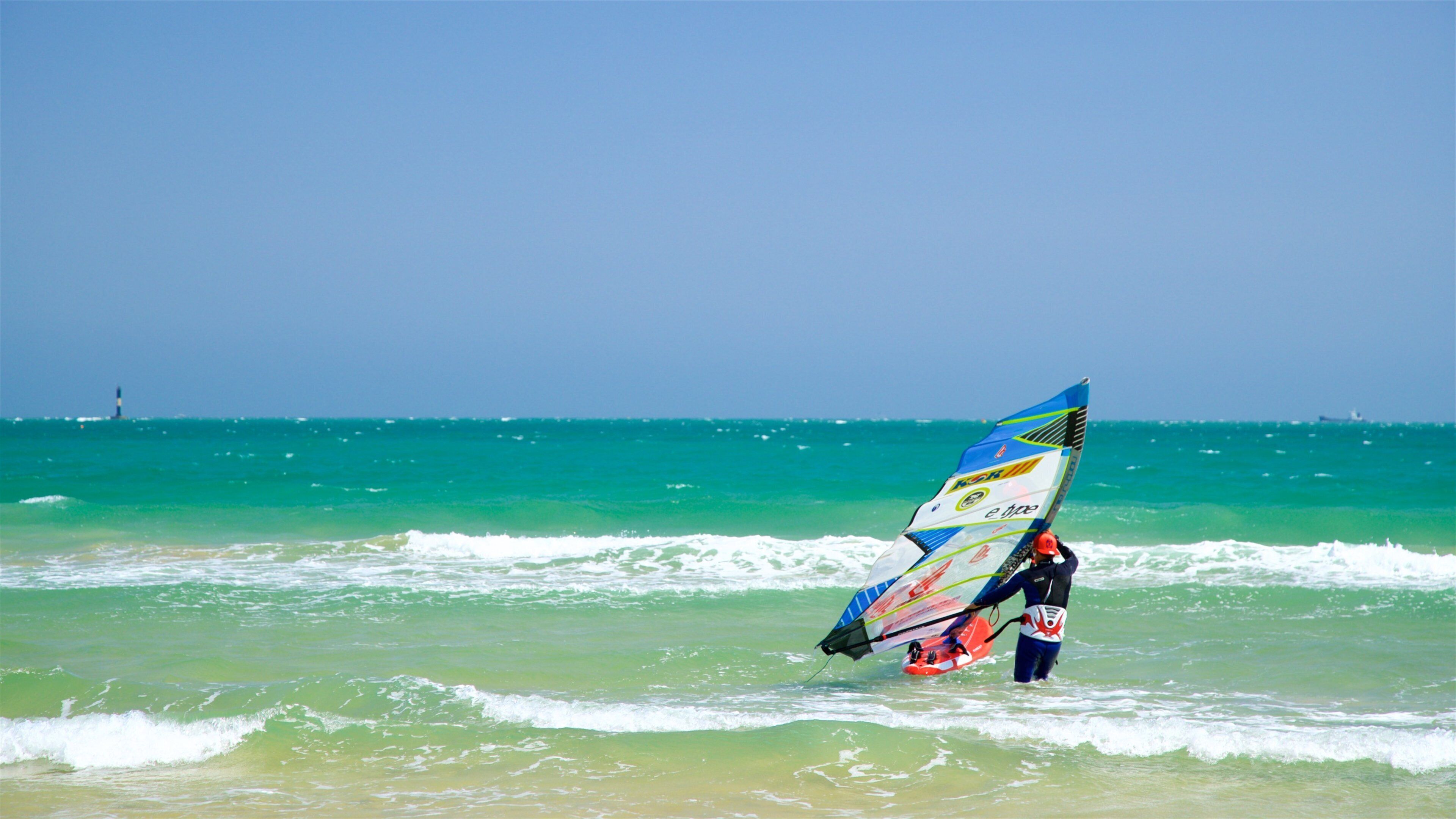 Songjeong Beach featuring general coastal views, waves and kite surfing