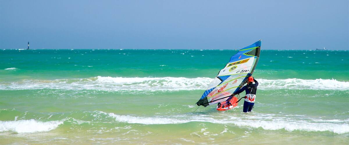 Songjeong Beach featuring general coastal views, waves and kite surfing