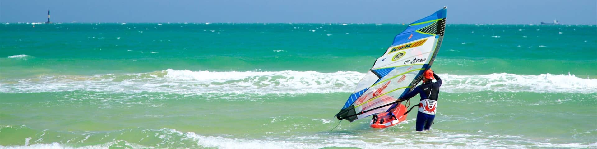 Songjeong Beach featuring general coastal views, waves and kite surfing